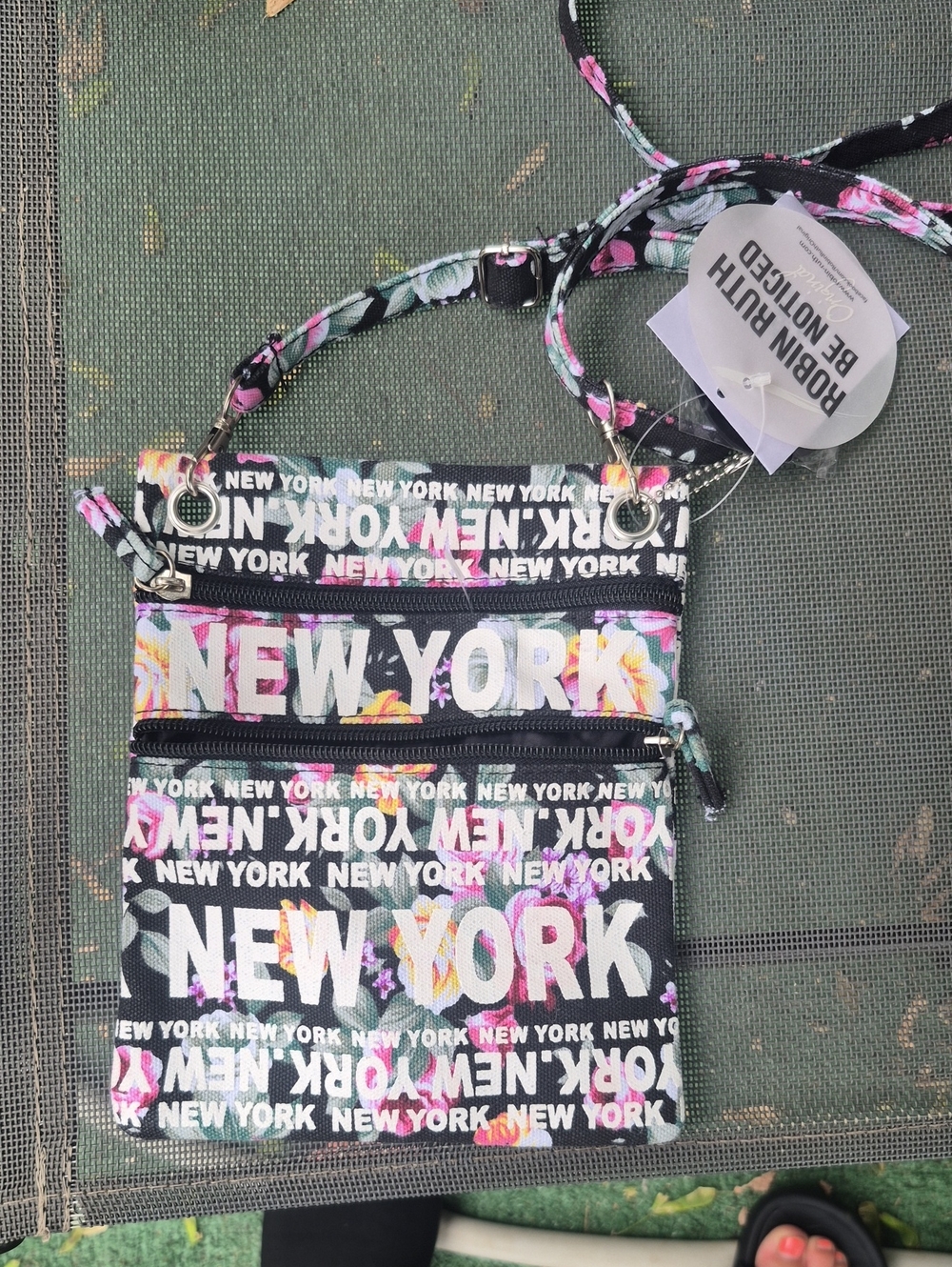 Robin Ruth Black Crossbody Bag with Pink Floral Accents and White NEW YORK Print